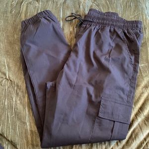 Black sweat material cargo pants.